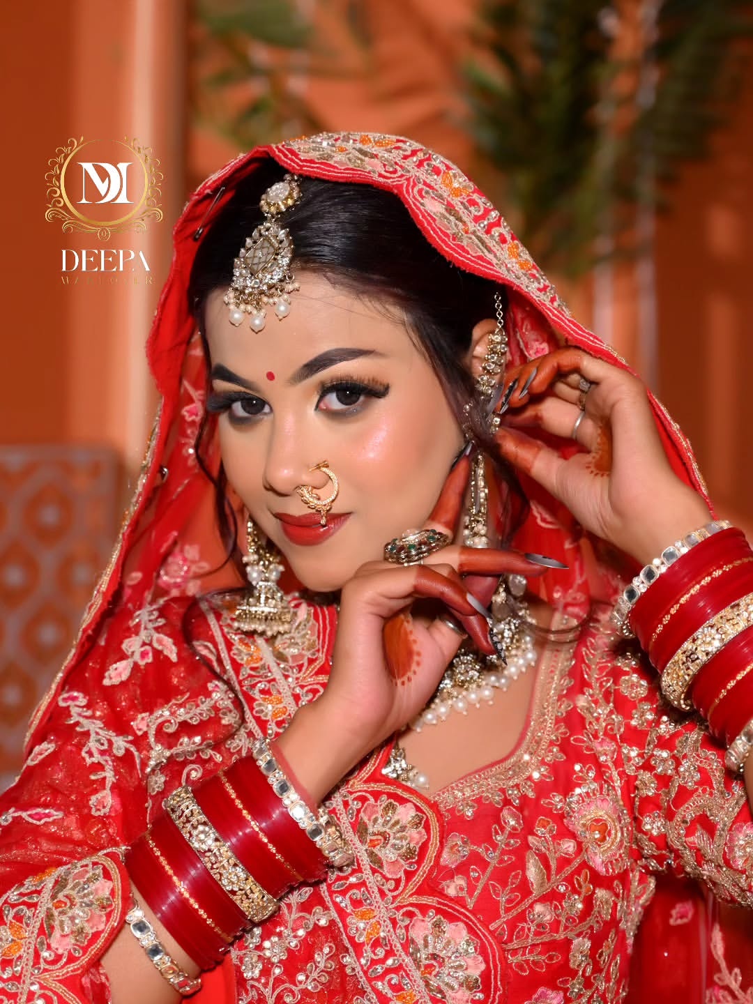 Classic red bridal makeover created by Deepa Baranwal